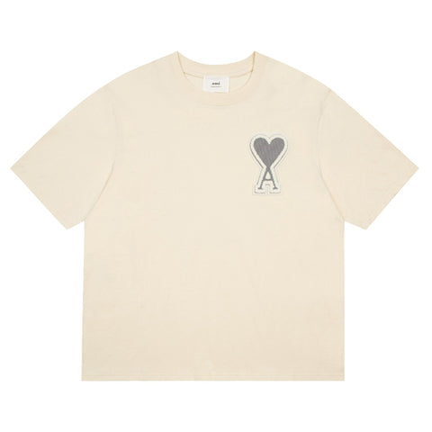 AMI Paris Oversized Logo-Appliquéd Cotton-Jersey T-Shirt Cream