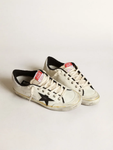 Golden Goose Super-Star beige canvas with black leather star and white leather heel tab