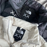 KAWS x The North Face Retro 1996 Nuptse Jacket Moonlight Ivory