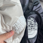 KAWS x The North Face Retro 1996 Nuptse Jacket Moonlight Ivory